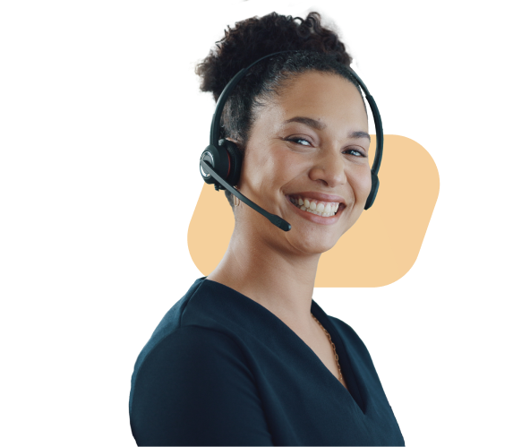 A woman wearing a headset and smiling.